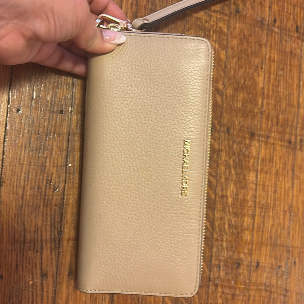 Jet set travel large leather continental wallet beige